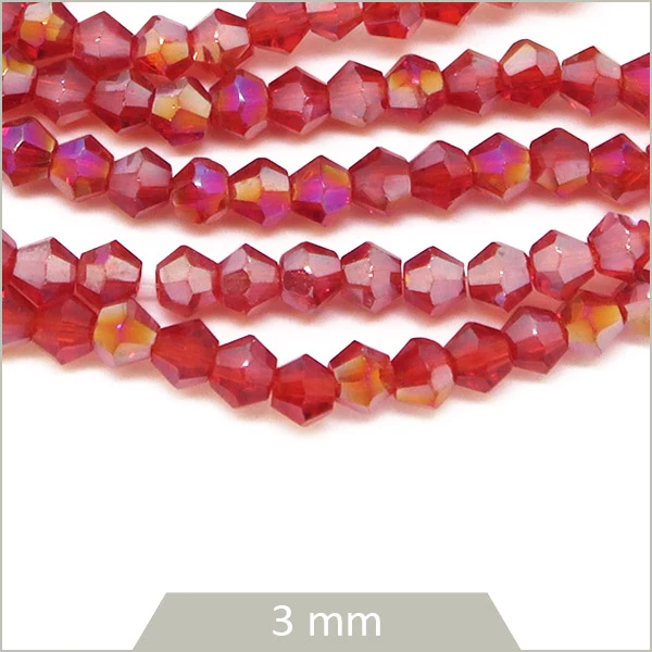 Env. 135 perles de verre toupies rouge irisé, 3 mm