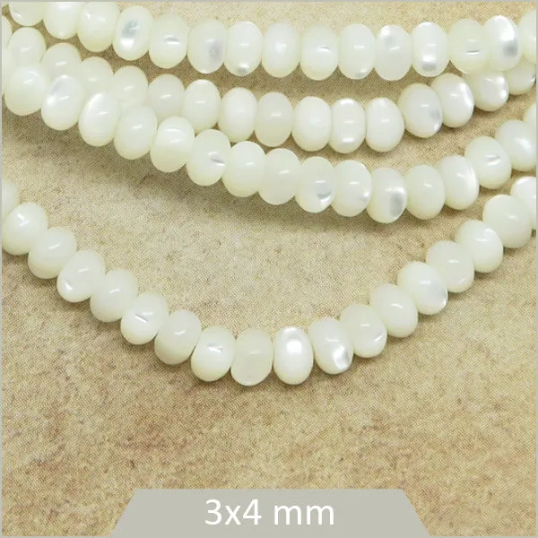 Env. 145 perles soucoupe en coquillage blanc nacré, 4x3 mm