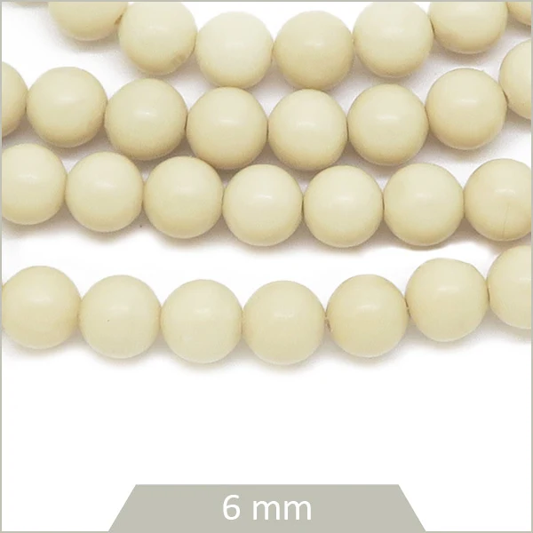 Env. 60 perles rondes en pierre fossile, 6 mm