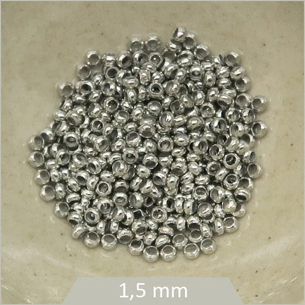 2 gr (env.250 pcs) perles à écraser laiton 1,5 mm