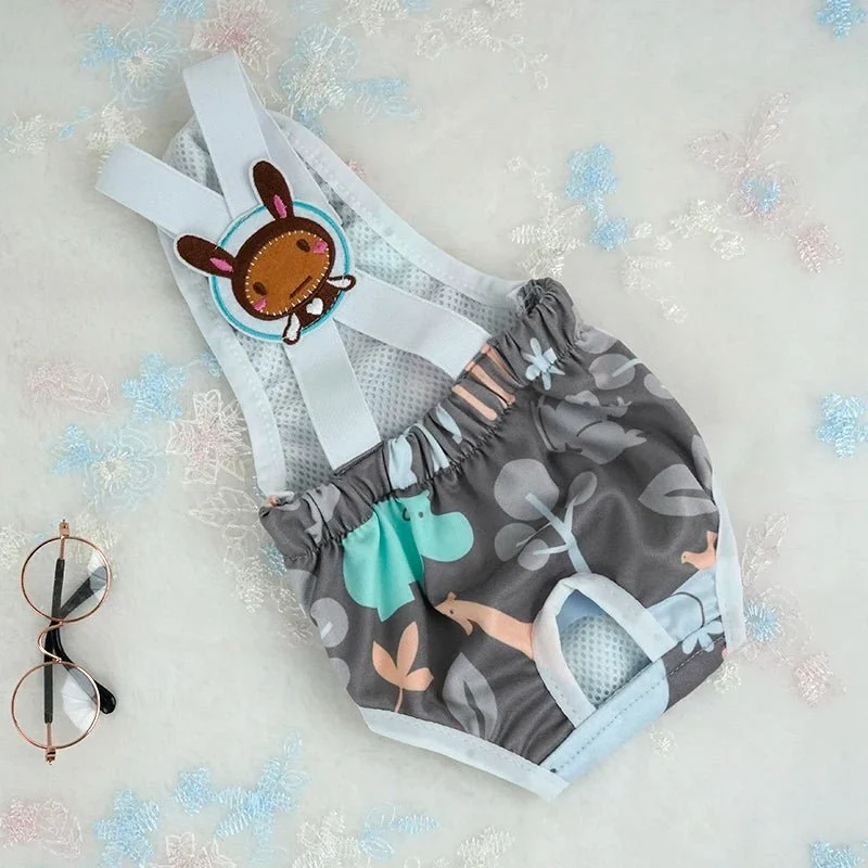 Couche avec bretelles pour chien