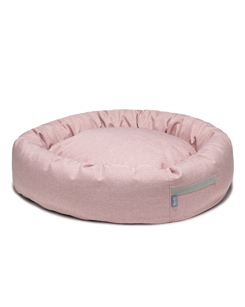 Cama redonda para perro rosa suave
