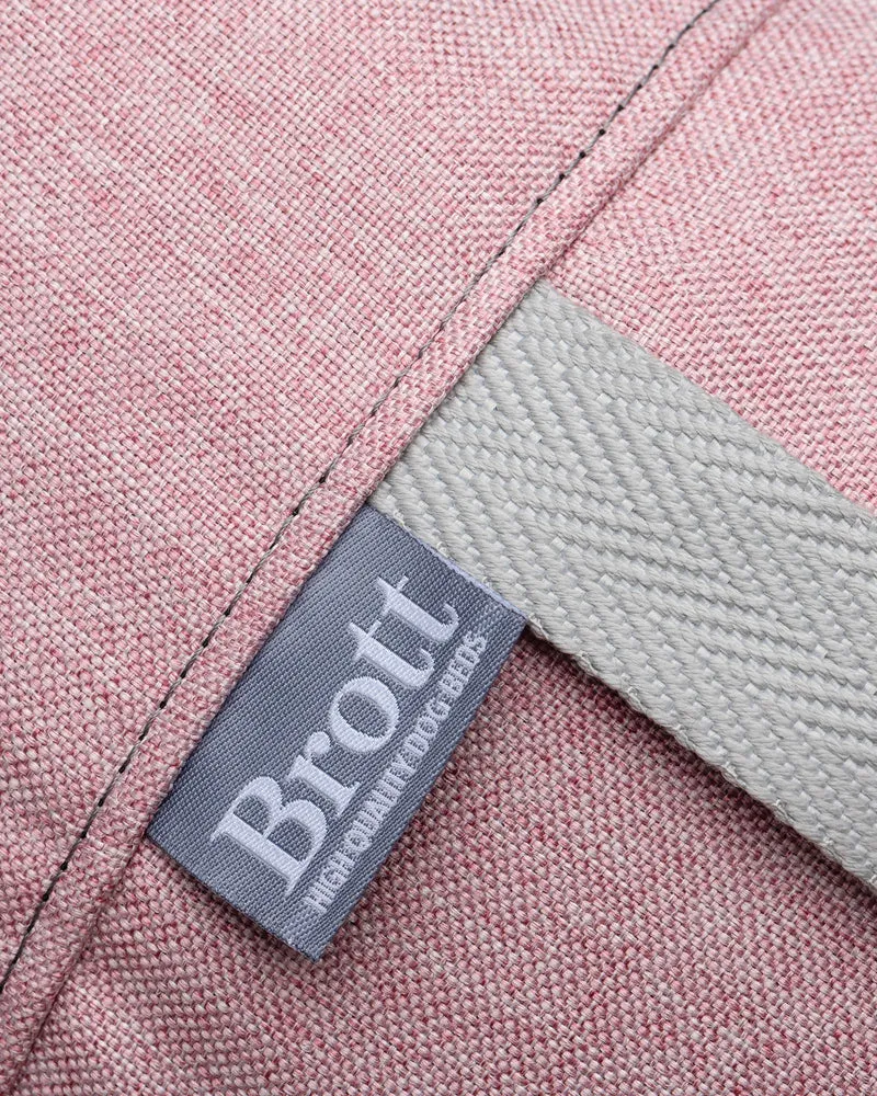 Cama redonda para perro rosa suave