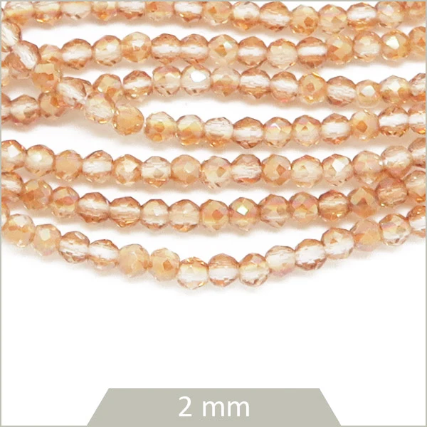Env. 220 perles de verre à facettes rose orangé, 2 mm
