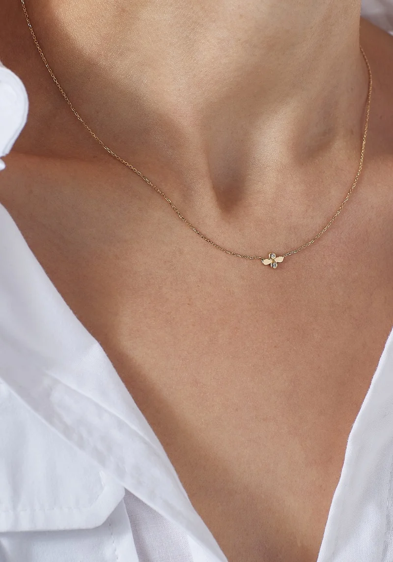 COLLIER INES