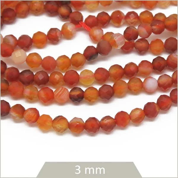 Env. 119 perles à facettes en cornaline 3 mm