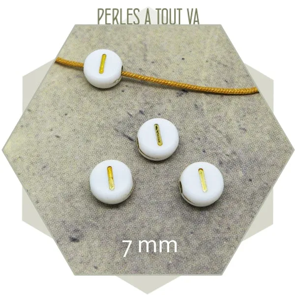 7g de perles lettre I, blanches et or (50 perles env.)