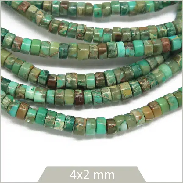 Env. 170 perles heishi en Régalite teintée
