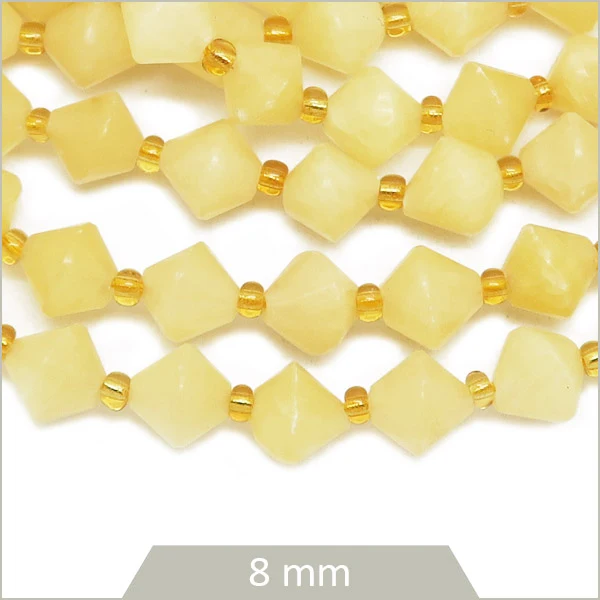 Env. 35 perles toupies en Calcite, 8 mm