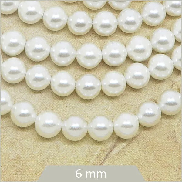 Env. 63 perles coquillage polies grade A 6 mm