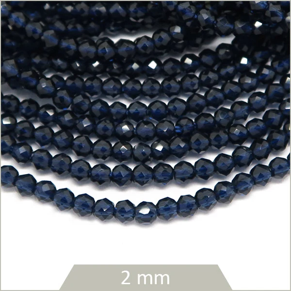 Env. 180 perles de verre à facettes bleu nuit, 2 mm