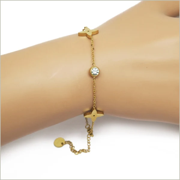 1 bracelet étoile et strass en acier inoxydable doré 17,5cm