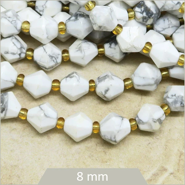 Env. 35 perles toupies en Howlite, 8 mm