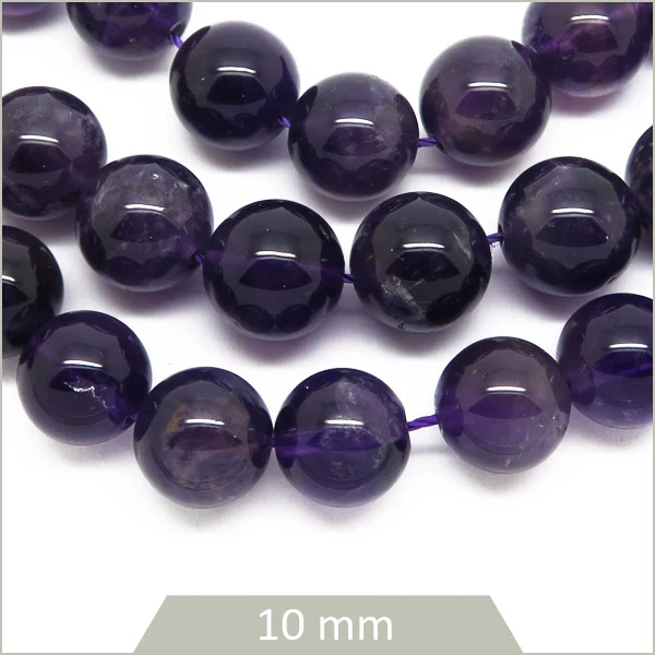 Env. 20 perles rondes Améthyste 10 mm