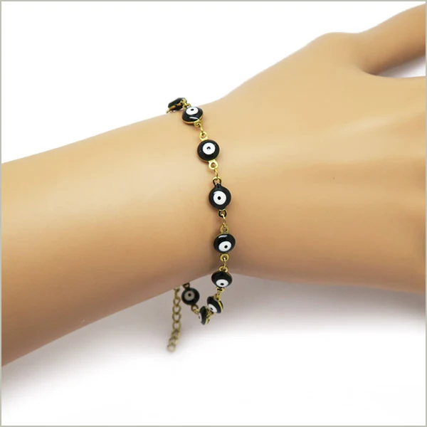 1 bracelet maillon œil noir acier inoxydable doré 16,5cm