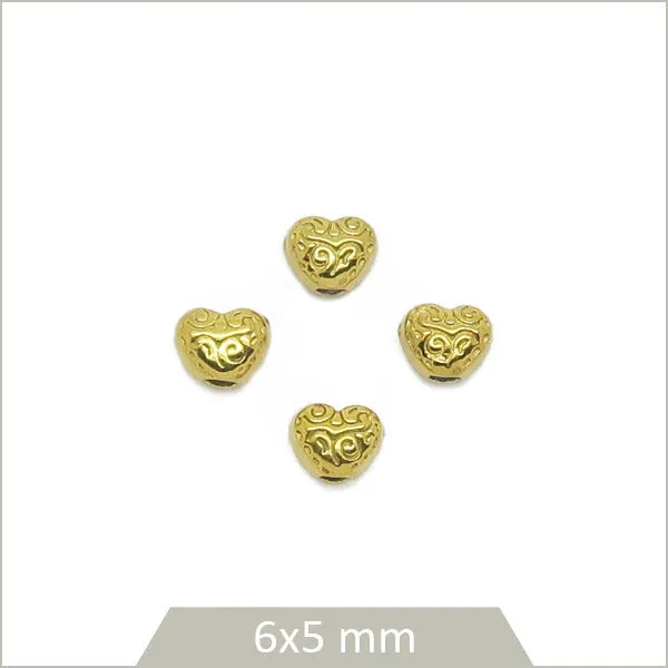 4 perles coeurs ethniques en acier inoxydable doré