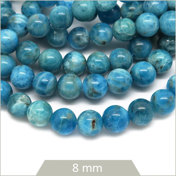 Env. 50 perles rondes en Apatite lagon 8 mm