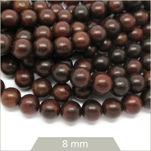 Env. 45 perles en bois brun foncé 8 mm