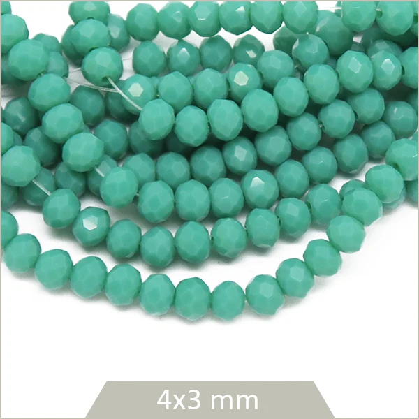 Env. 110 perles de verre à facettes donuts bleu turquoise 4x3 mm