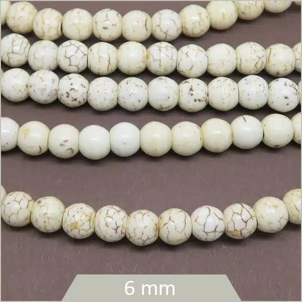Env. 75 perles rondes 6 mm Howlite teintée ivoire