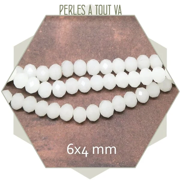 Env. 95 perles de verre à facettes donuts blanches 6x4 mm