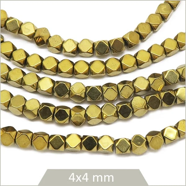 Env. 100 perles polygones 4 mm en hématite doré métallisé