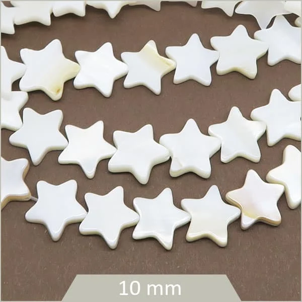 Env. 40 perles étoiles nacrées 10 mm