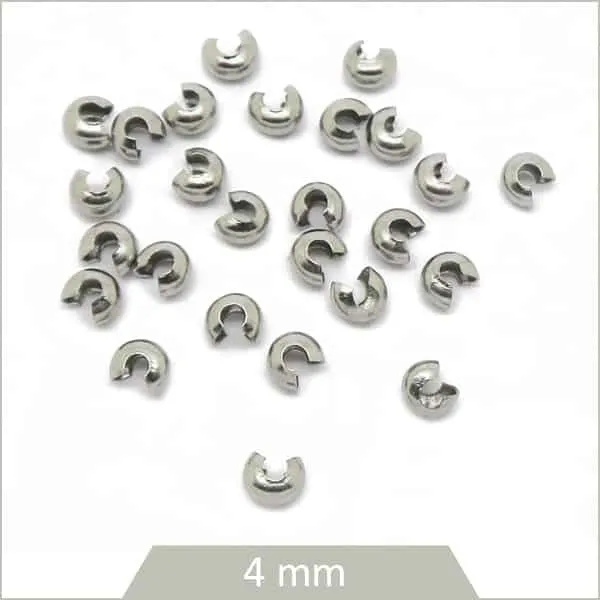 Env. 30 perles cache nœud en acier 4 mm