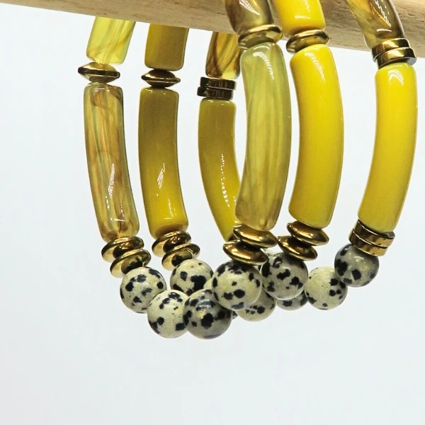 12 perles tubes incurvés jaune 8 mm