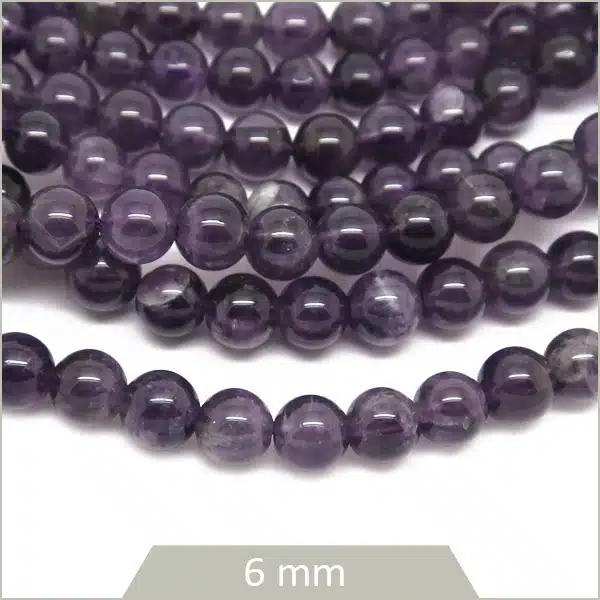 Env. 58 perles rondes Améthyste 6 mm