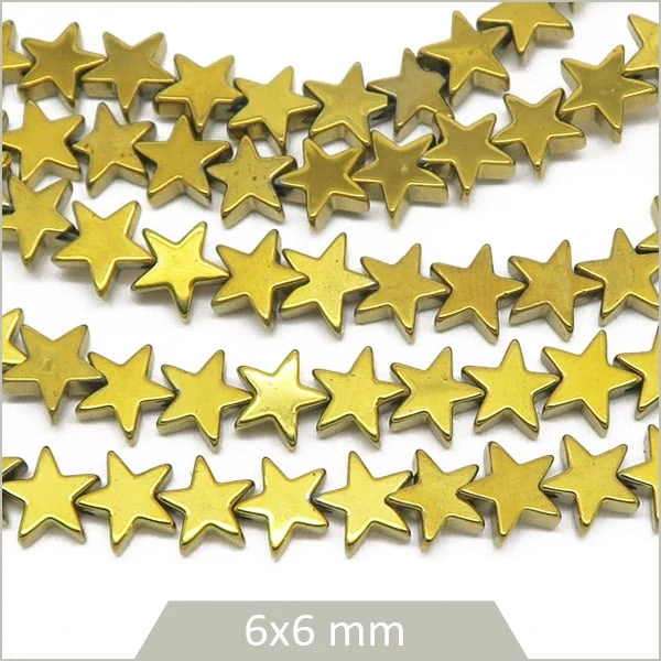 Env. 85 perles étoiles en hématite doré métallisé 6 mm