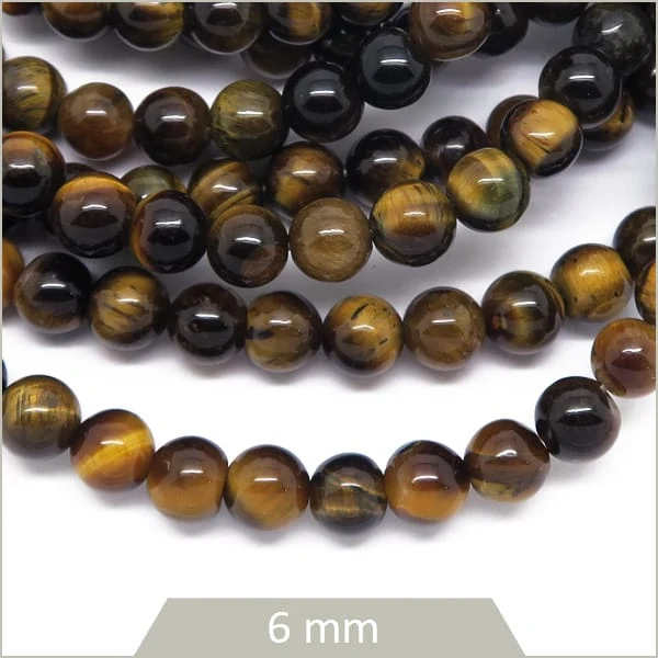 Env. 61 perles rondes 6 mm Œil de tigre