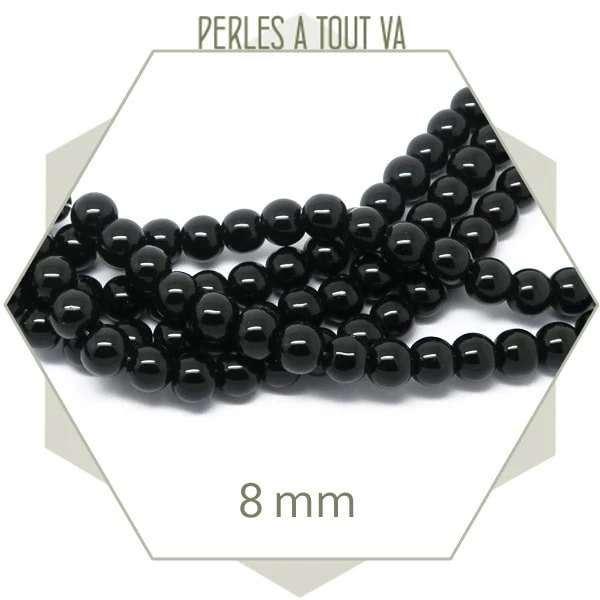 Env. 40 perles de verre rondes 8 mm noires