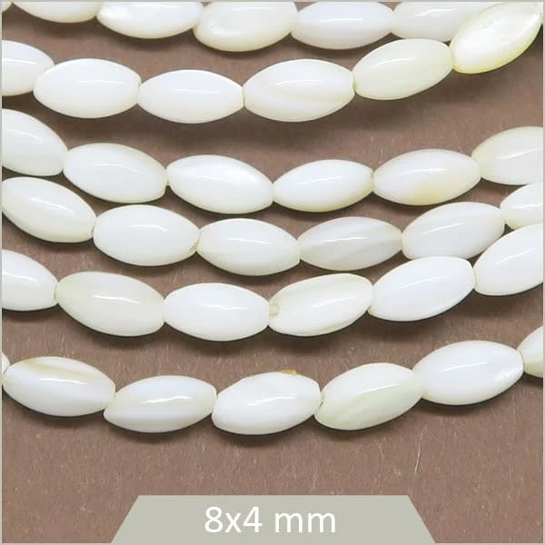 Env. 48 perles grain de riz en coquillage 4x7 mm, blanc crème