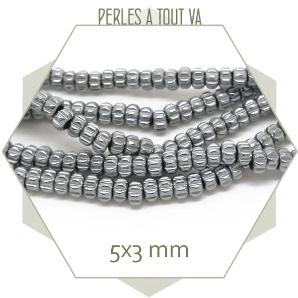 Env. 128 perles donut crantées en hématite couleur argent