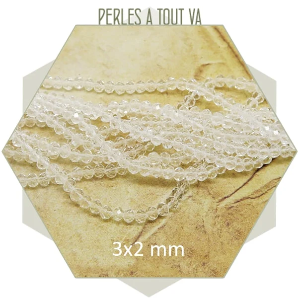 Env. 145 perles donuts à facettes en verre 3x2 mm transparente
