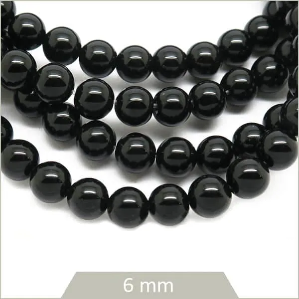Env. 60 perles rondes d'Onyx, 6 mm