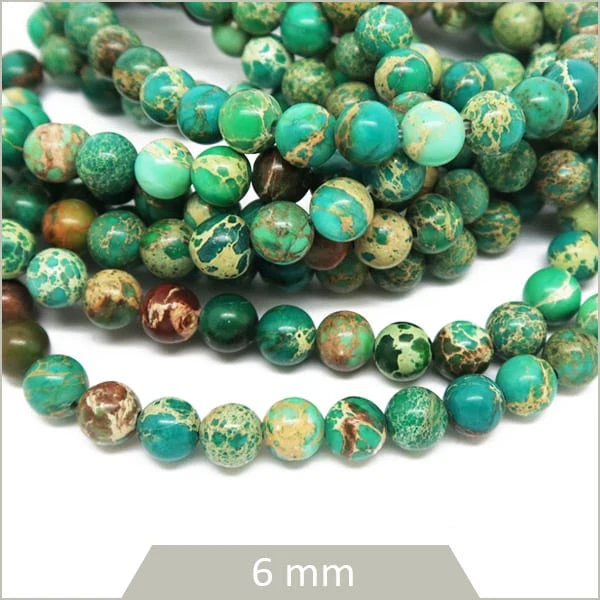 Env. 58 perles rondes Régalite teinté vert, 6 mm