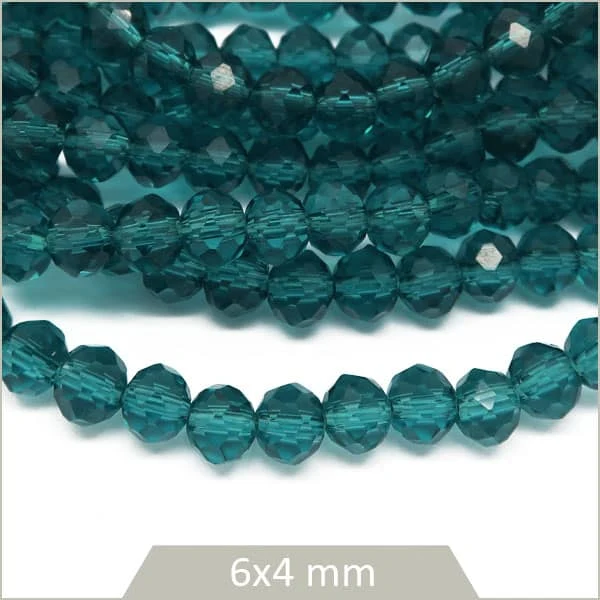 Env. 85 perles de verre à facettes donut bleu pétrole transparent 6x4 mm