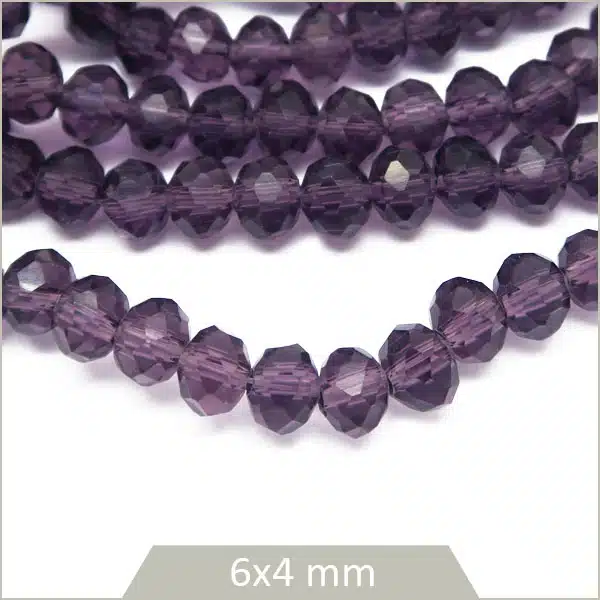 Env. 85 perles de verre à facettes donut violet transparent 6x4 mm