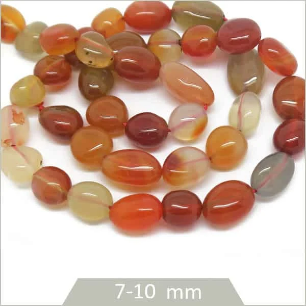 Environ 48 de perles galets en cornaline calibre 7mm
