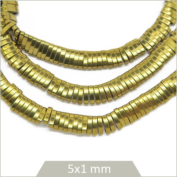 Env. 335 perles quart de Tila en hématite doré