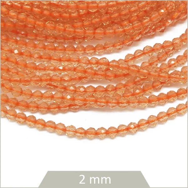Env. 175 perles de verre à facettes 2 mm, pêche