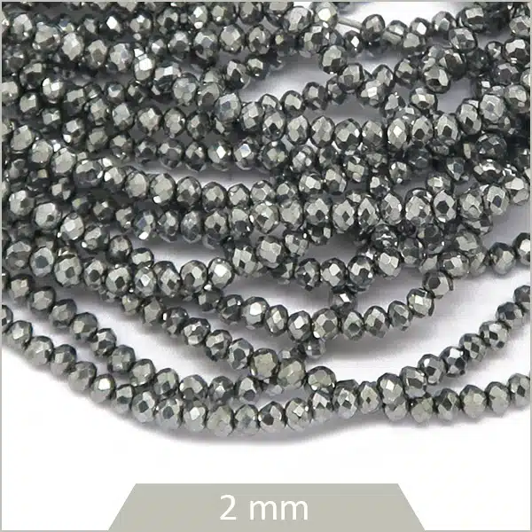 Env. 220 perles de verre donut 2x1,8 mm, argent