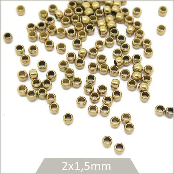 Env. 350 perles à écraser 2x1,5 mm en laiton brut