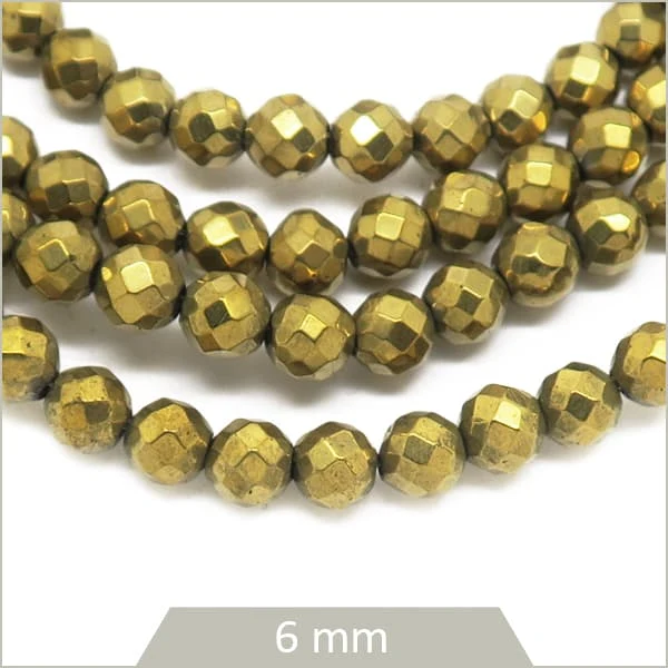 Env. 65 perles à facettes 6 mm en hématite doré métallisé