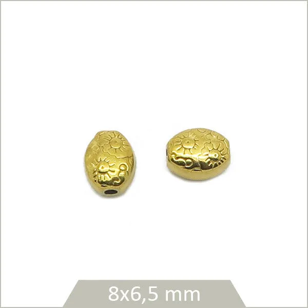 2 perles ethniques ovales motif soleil en acier inoxydable doré