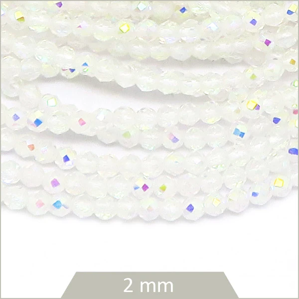 Env. 180 perles de verre à facettes blanche transparentes irisées, 2 mm