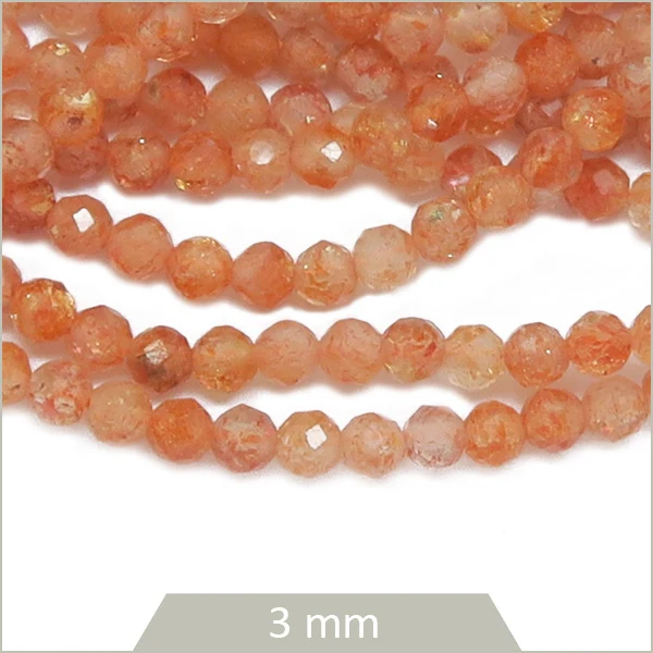 Env. 120 perles facettées en Pierre de Soleil dorée, 3 mm