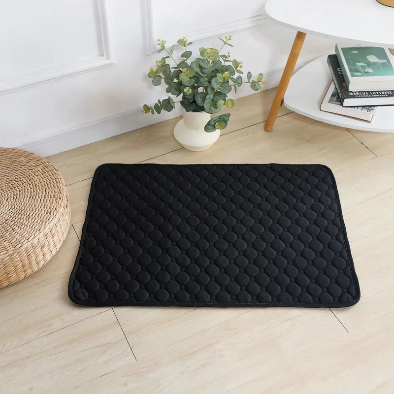 Tapis absorbant et réutilisable pour animaux